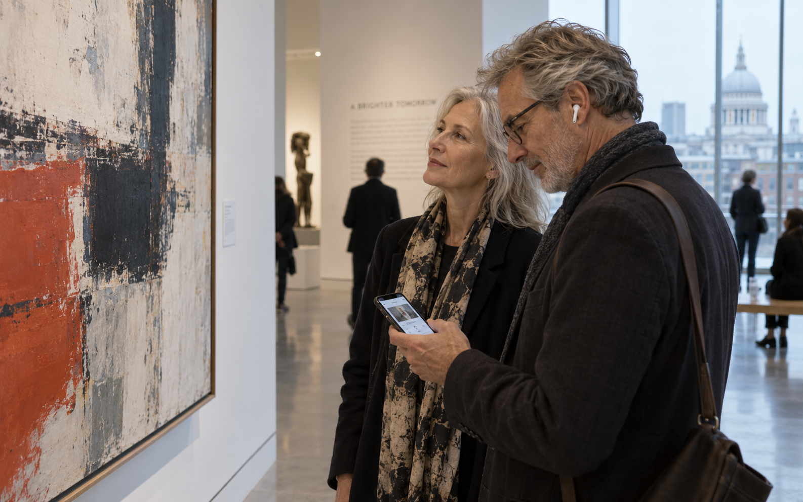 An older couple uses the Is museum guide in London